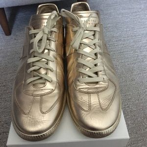 Gently worn stylish sneakers.